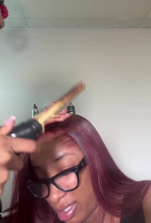Hairstylist Accidentally Presses Hot Comb Against Client's Scalp