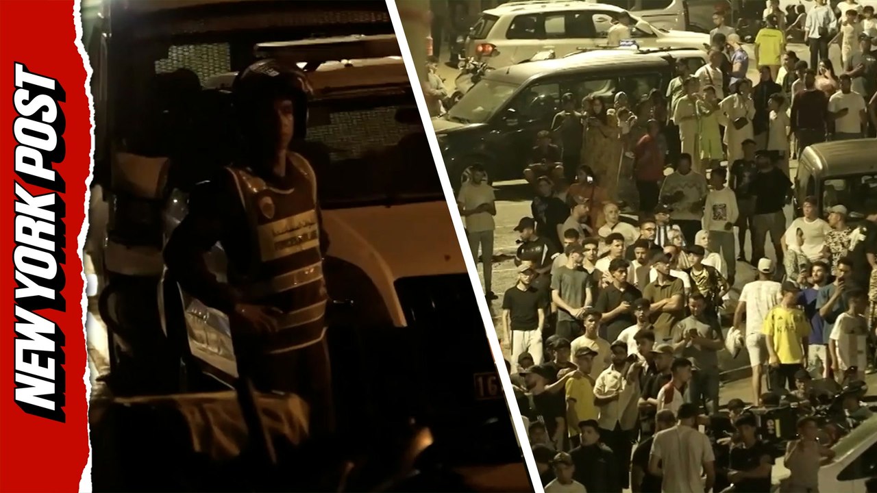 Moroccan security forces severely outnumbered while trying to block migrants from reaching Spain