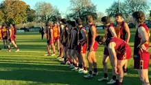 Grant Bell chaired off after 200th game