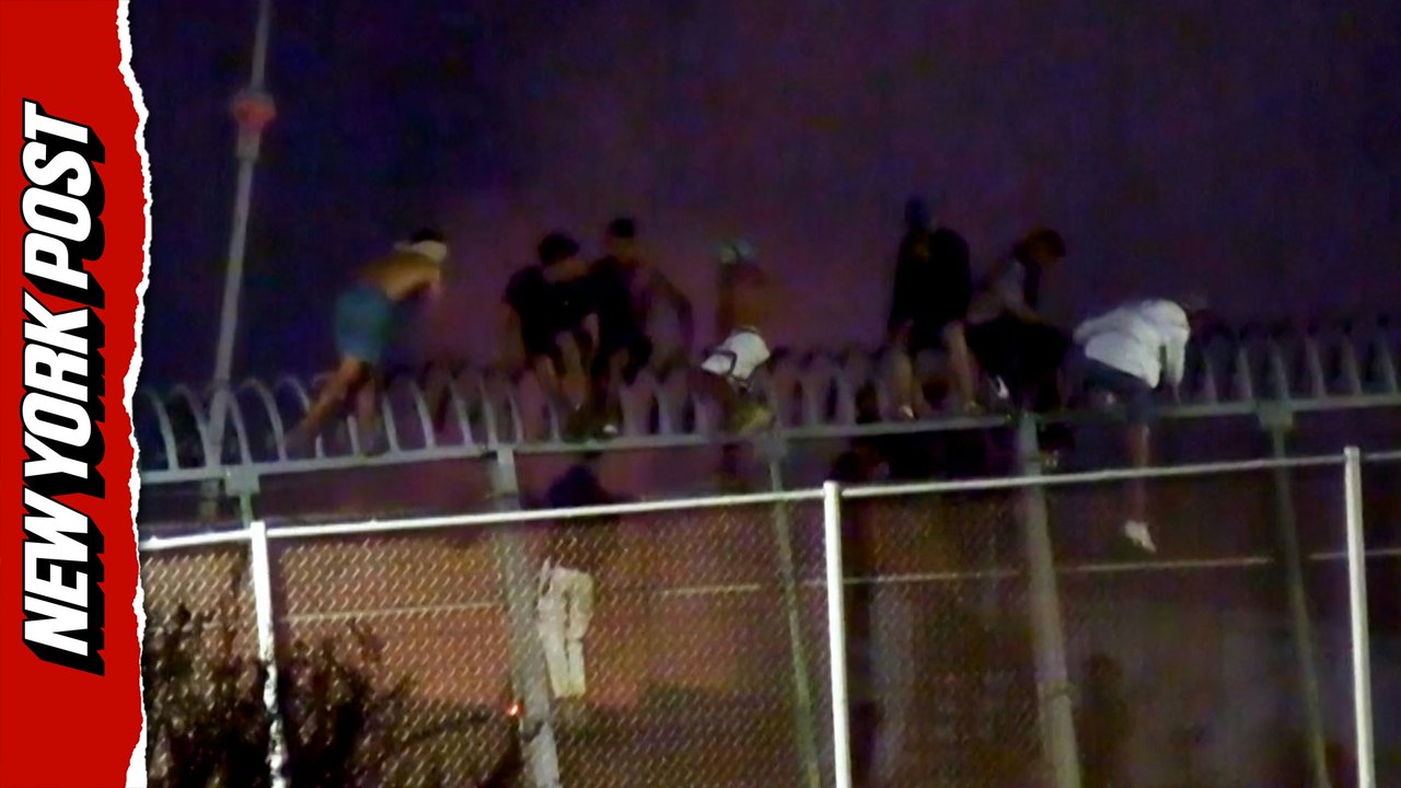 Insane footage shows migrants scaling border fence in Melilla, Spain