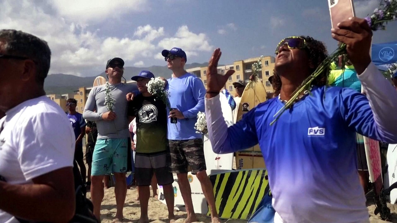 Venezuelan surfers honor victims of the earthquake with traditional 'paddle out' ceremony