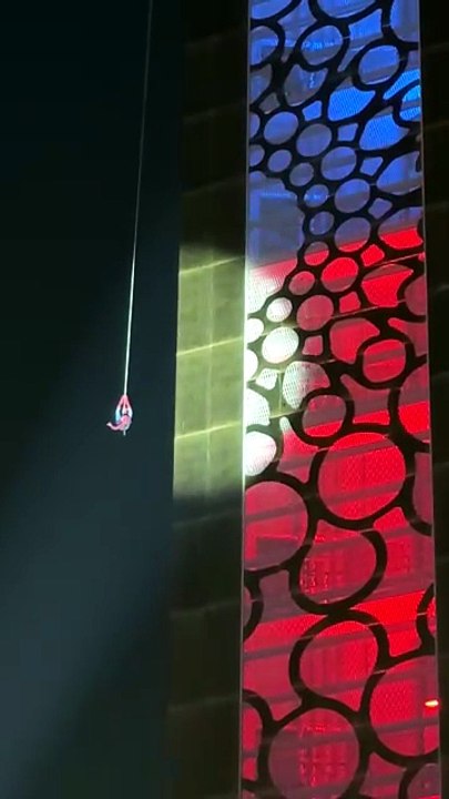 Spiderman dangles off Dubai Frame