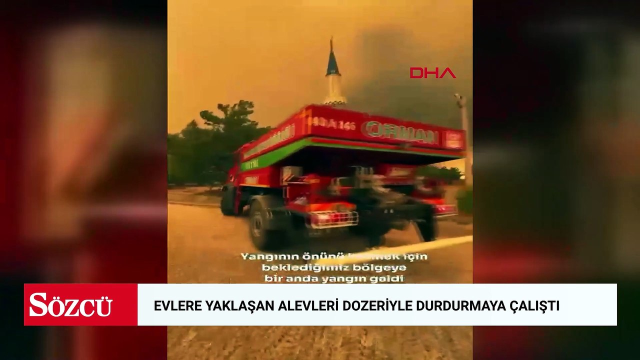 Muğla'da evlere yaklaşan alevleri dozeriyle durdurmaya çalıştı