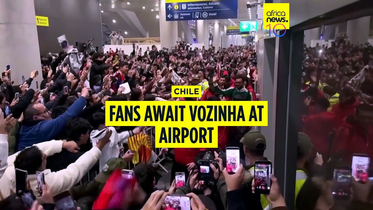 Fans await Vozinha at Santiago's airport after visa complications
