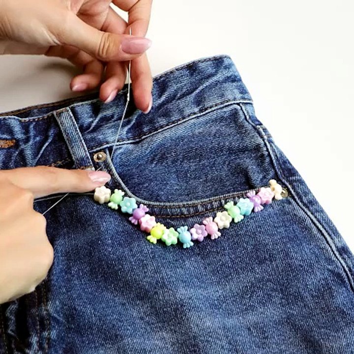 Embroidering beads to your jeans is the new trend💓