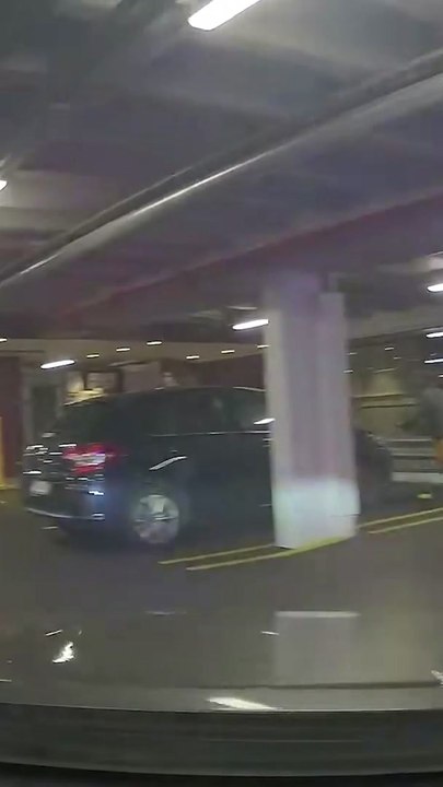 Officer weaves through parking lot to catch suspect