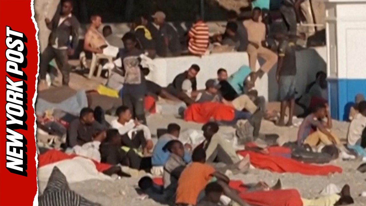 Migrants loiter on Ceuta beach as thousands remain after border rush