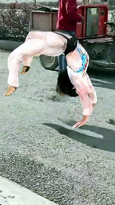 Failed backward roll—violent collision.