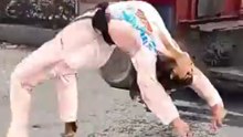 Failed backward roll—violent collision.