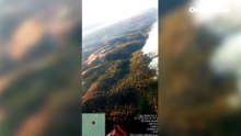Medios aéreos y cien efectivos por tierra combaten un incendio en Niebla (Huelva) que ha obligado a desalojar dos aldeas