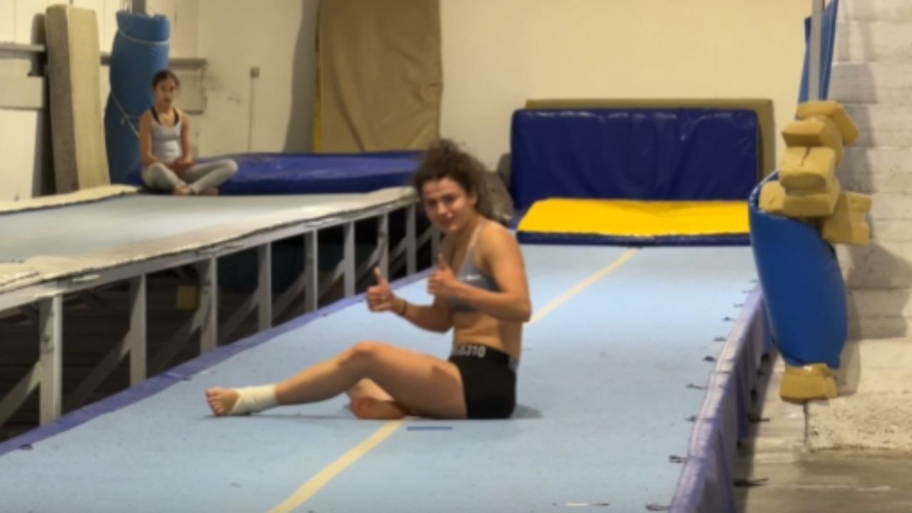 Athlete Falls During A Tumbling Track Training Run