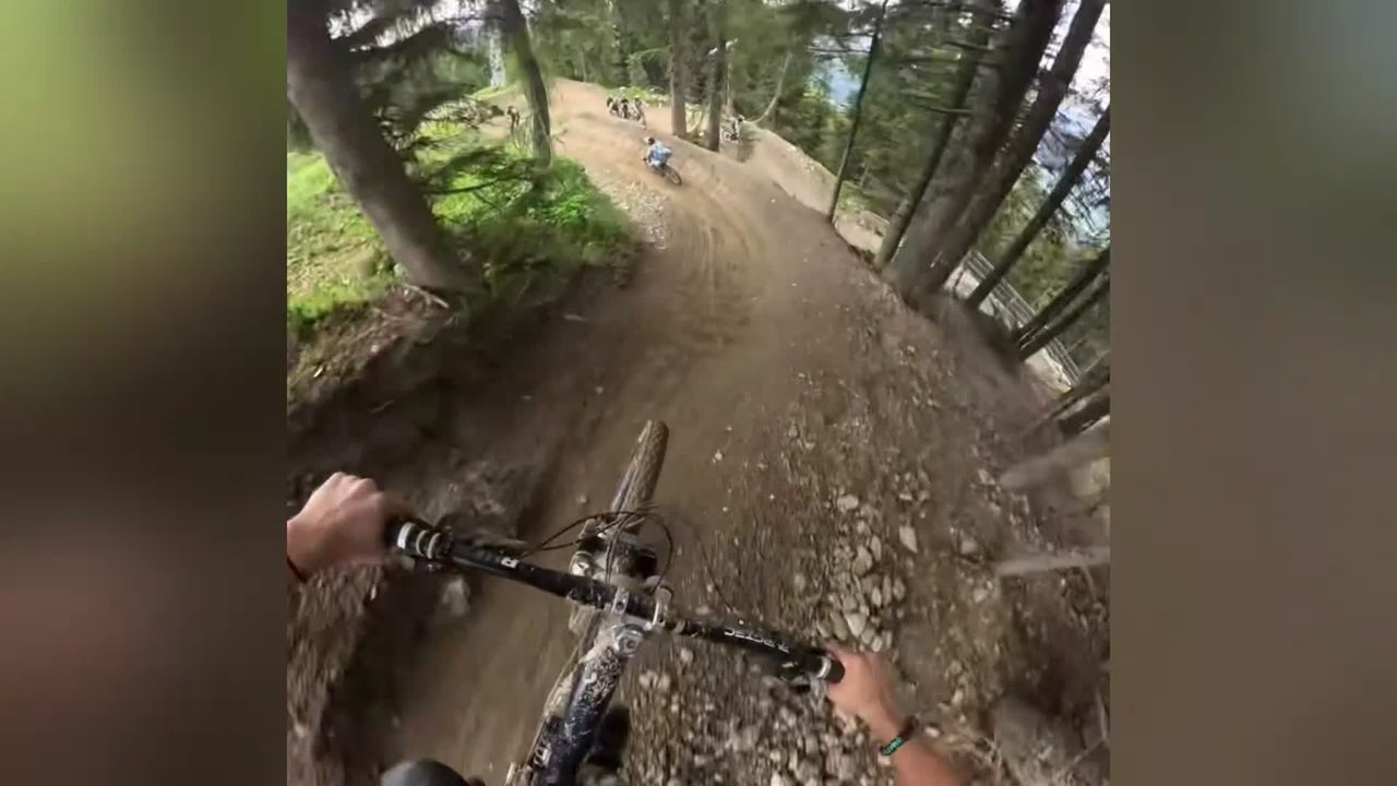 Mountain Biker Crashes Across Trail on Downhill Run