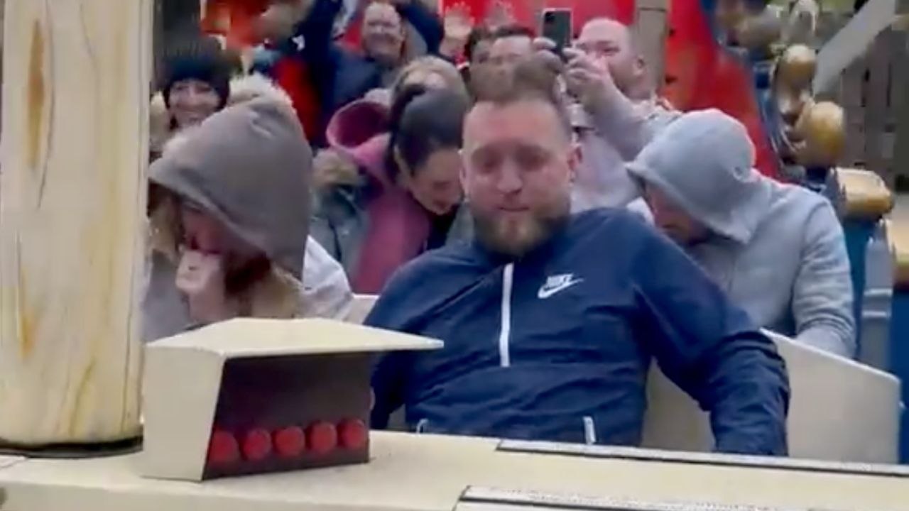 Boy Seems Scared While Riding Small Amusement Attraction