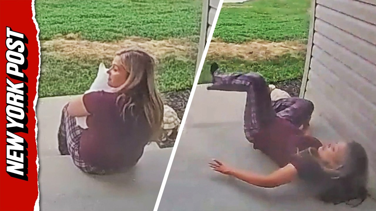 Cat launches out of woman's arms after lightning strike, knocking her flat on her back
