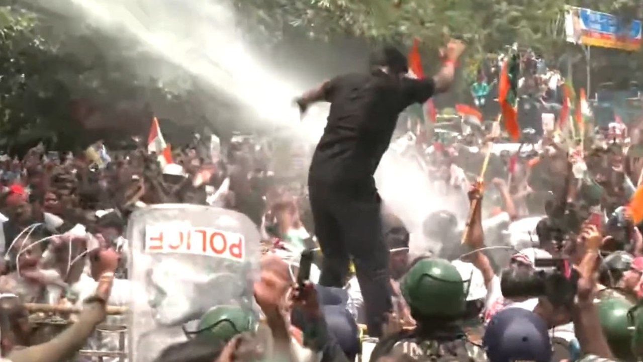 Video: Jharkhand protesters dance as police use water cannon to disperse crowd