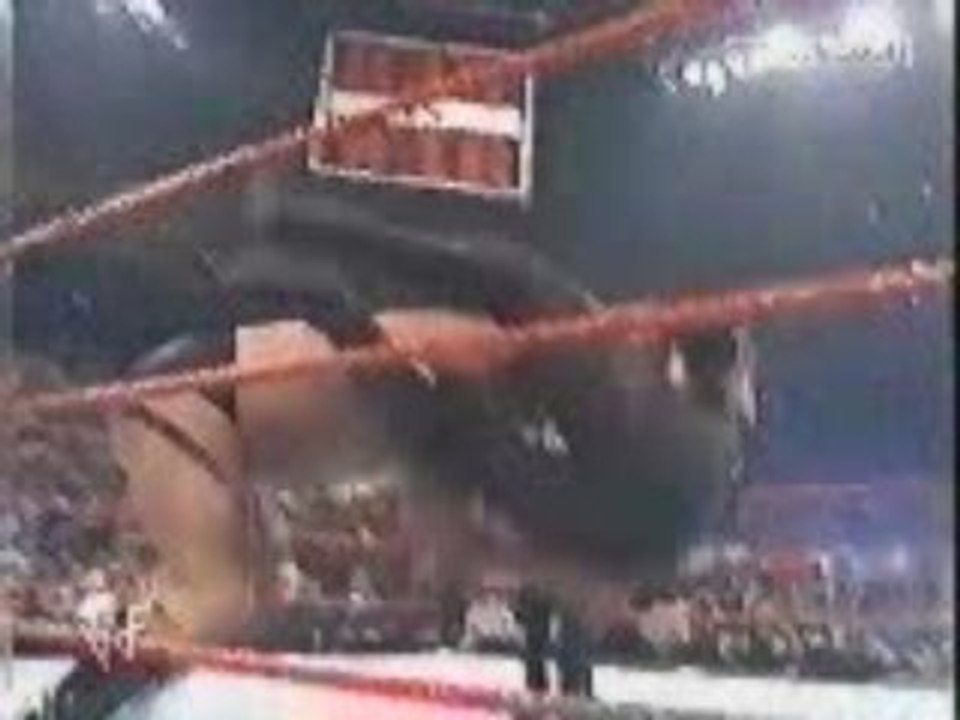Big Show chokeslams Undertaker through the ring video Dailymotion