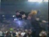Undertaker Chokeslams Shane  from top rope Through Table