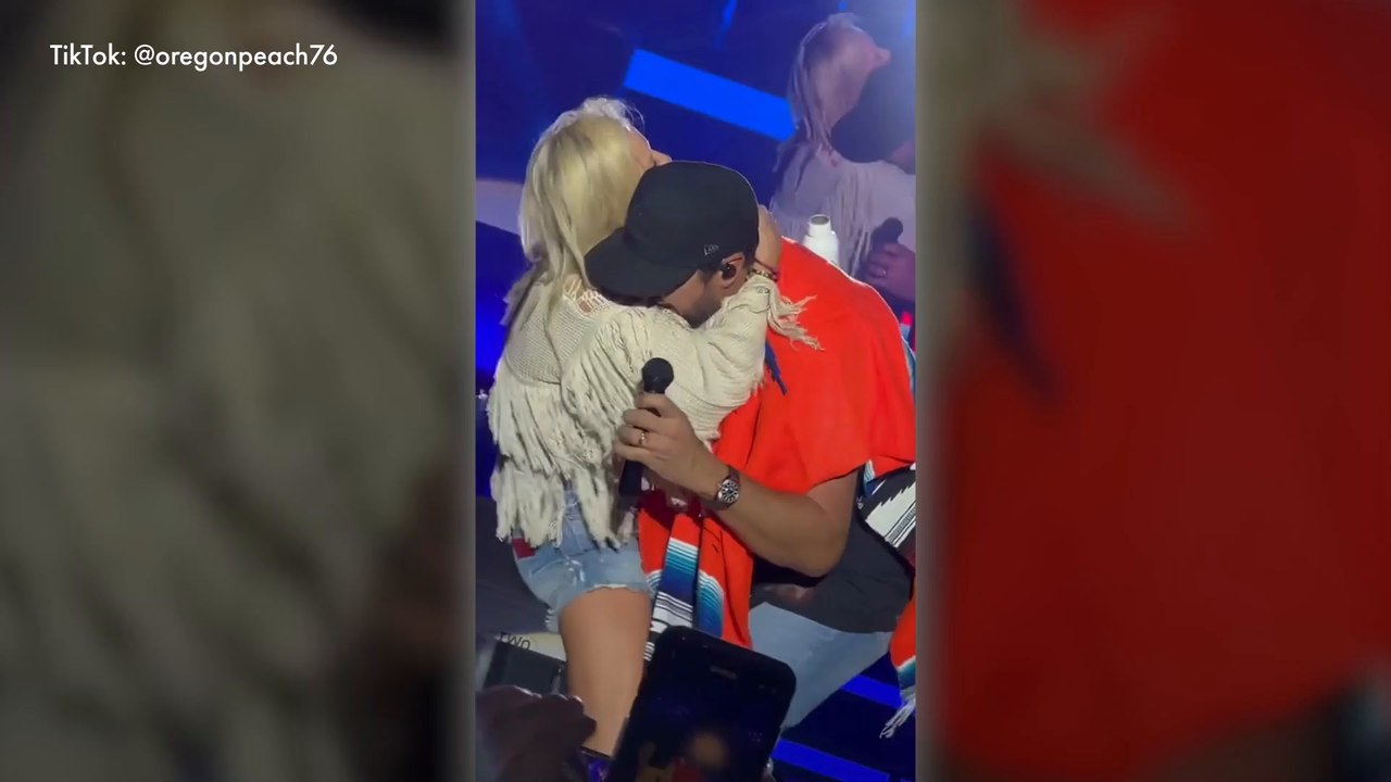 Luke Bryan surprised on stage by wife Caroline in sweet video