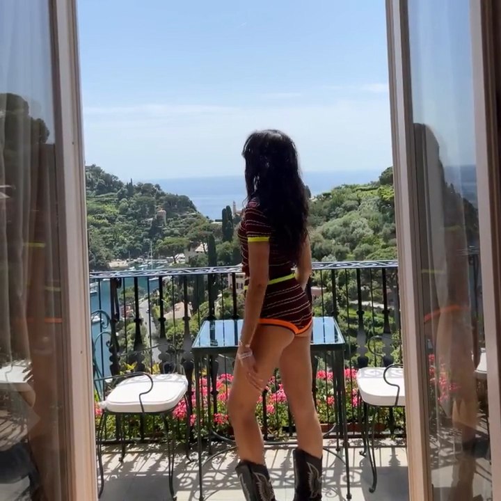 Dua Lipa shows off her sunkissed glow in tiny hotpants