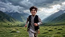 Boy running on the mountain