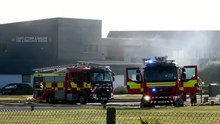Firefighters damping down at the scene of the blaze at Castletown fire station