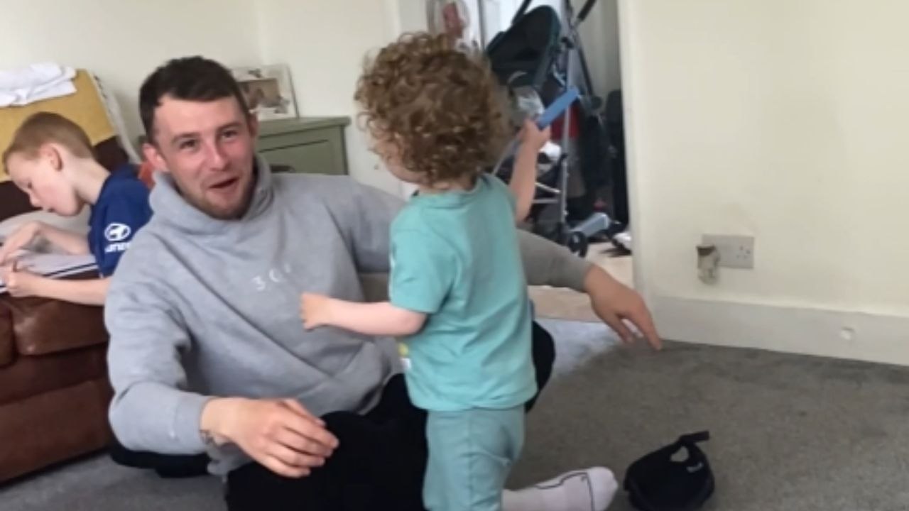 Toddler Playfully Strikes Dad's Face in Heartwa...