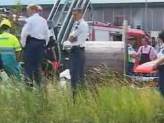 Auto te water na ongeval - parkeerterrein Hornbach Zaandam