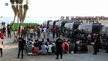 Imágenes del desalojo y traslado de los inmigrantes en Ceuta