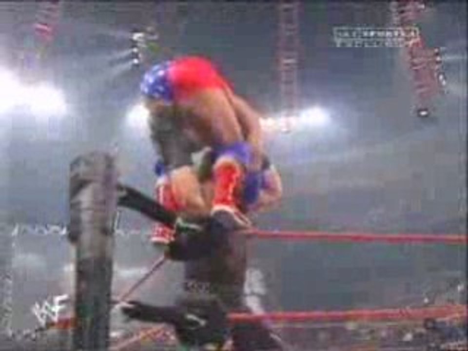 WWE - Kane Throws Kurt Angle On To A Garbage Can