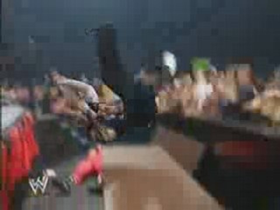 Jeff Hardy backdropped from ring onto table