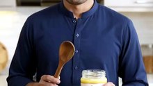 Man_sneaking_ghee_on_paratha_