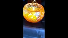 Orange faceted candle holder