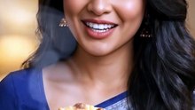 Priya_holding_garlic_cheese_naan