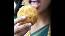 Pirya_biting_fried_rice_ball