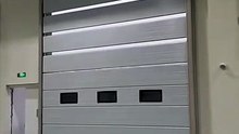 What is the difference between an overhead folding lift door and a sectional overhead door?