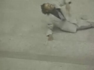 Dude Slides Down Escalator Rail