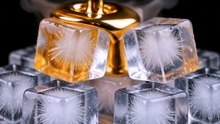 Liquid Gold Melting Ice Cubes