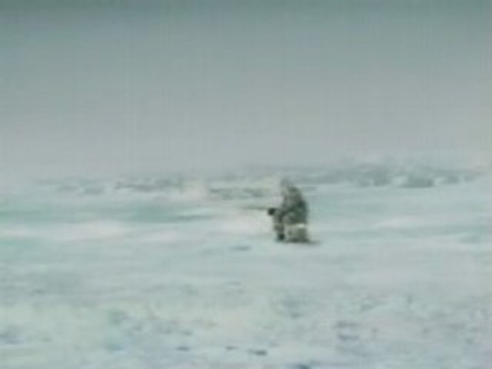 Eskimo Catches a Large Fish