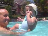 Grace at the pool at 5 1/2 months skiing on Ryan