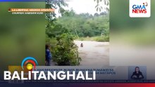 Ilang residente, buwis-buhay na tumawid sa rumaragasang ilog sa Brgy. Busilak matapos ang ulan | Balitanghali