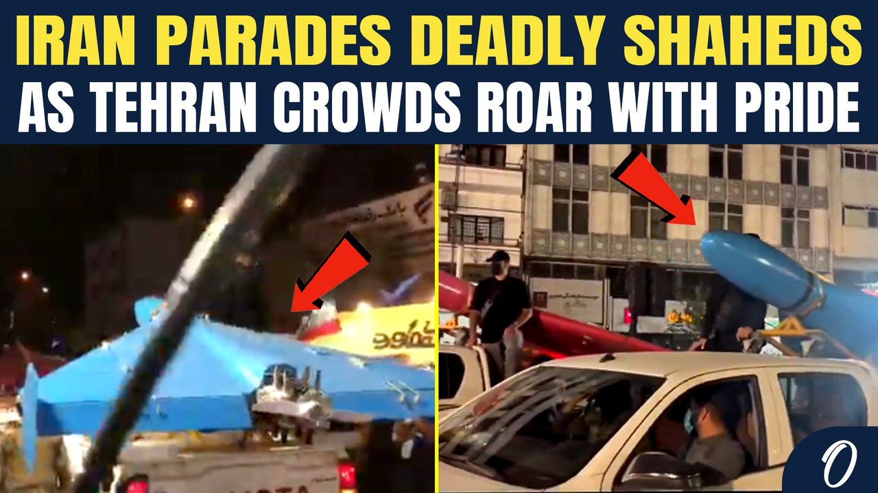 “Message To America”: Iran FLEXES Pink And Blue Shahed Drones On Tehran Streets
