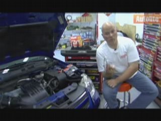 Autolite's Dave Buckshaw walks through a spark plug change