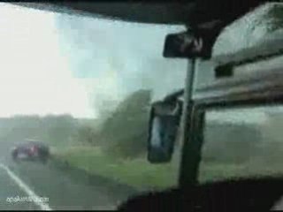 Tornado Flips a Bus