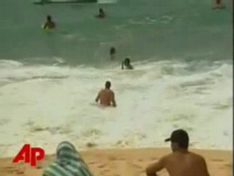 Barack Obama bodysurfing at Sandy Beach