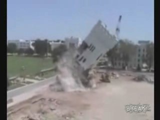 Building Collapses Onto Crane
