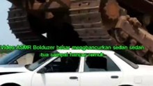 Video ASMR Bolduzer menghancurkan mobil tua