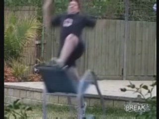Kid Wipes Out Jumping Over Chair