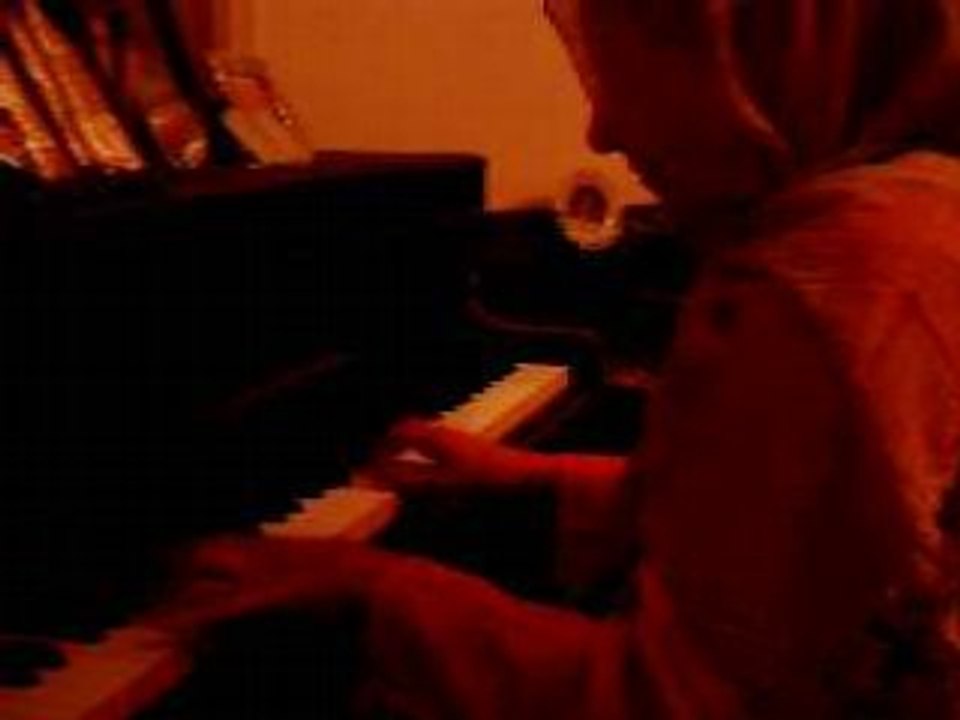 maman ki joue du piano =)