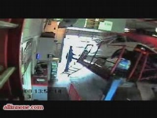 Garage Hoist Collapses Under SUV