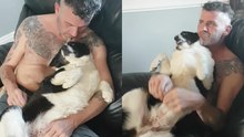 Adorable dog exhibits jealousy as her dad lavishes attention on his feline friend